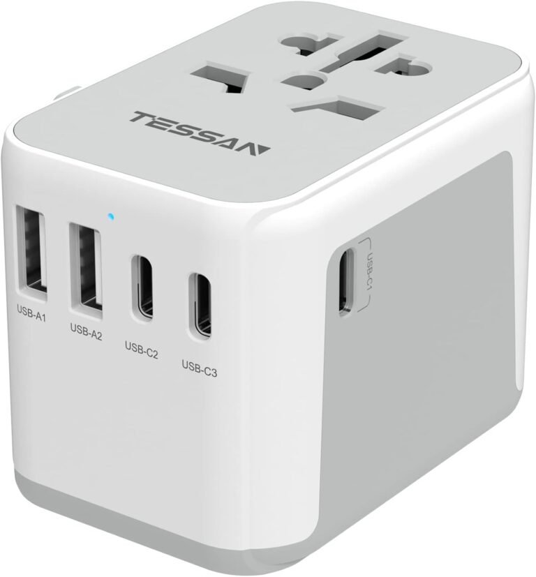 Travel adapter with international plugs and USB ports